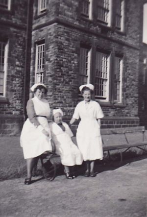 Mary Teale, left with staff.